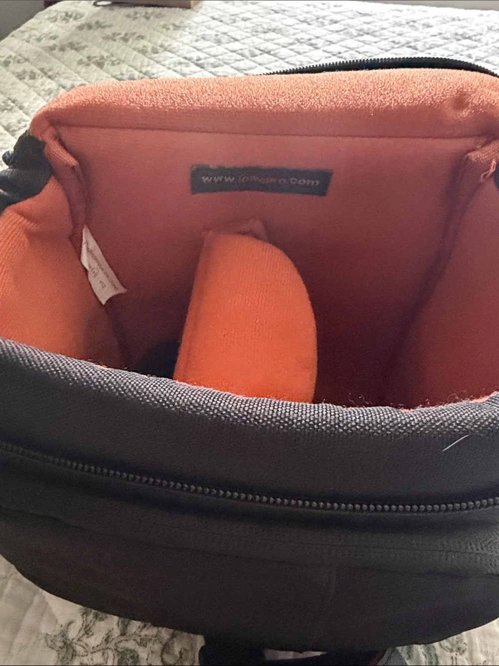 Canon DSLR Camera with Black Body and Red-Trim Strap